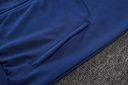 חליפת אימון אתלטיקו מדריד 25/26 – כחול כהה עם רוכסן מלא